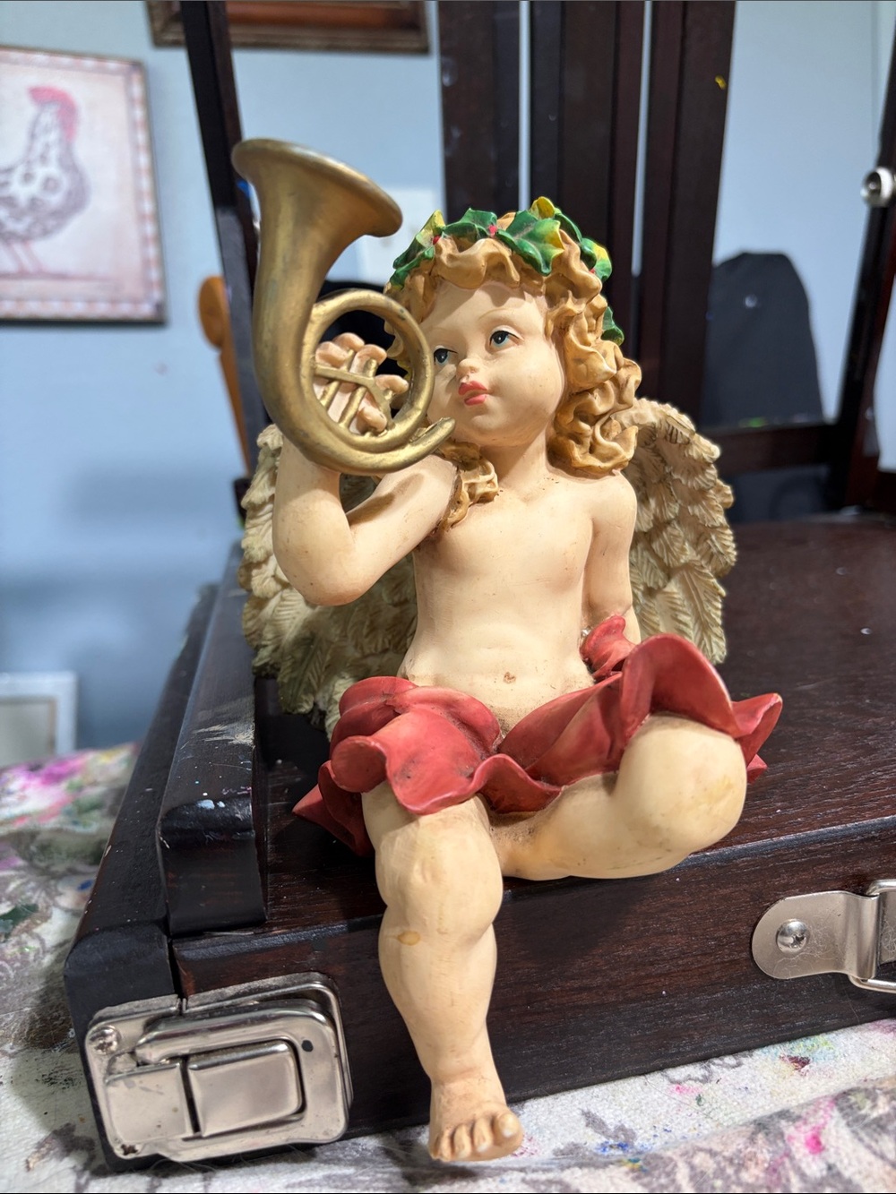 Vintage Cherub Sculpture with Gold Horn and Red Skirt
